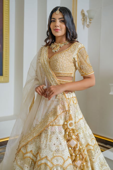 Tamaraa By Tahani_Gold Silk Organza Hand Embroidered Sequin Leaf Neck Vintage Bridal Lehenga Set _Online_at_Aza_Fashions