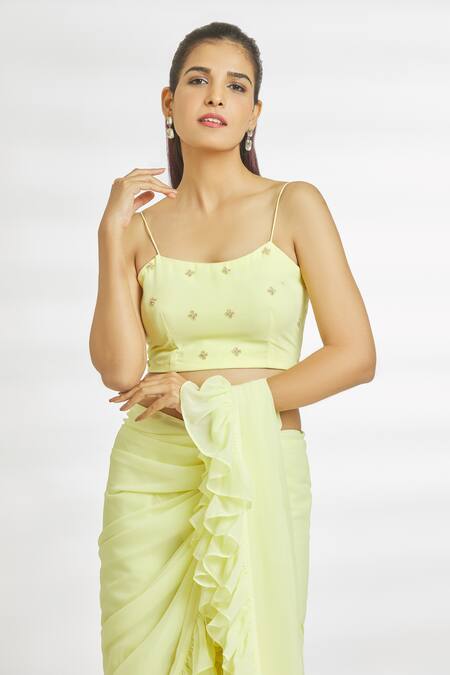 Naintara Bajaj_Yellow Georgette Beads Square Neck Ruffled Sharara Saree With Blouse_at_Aza_Fashions