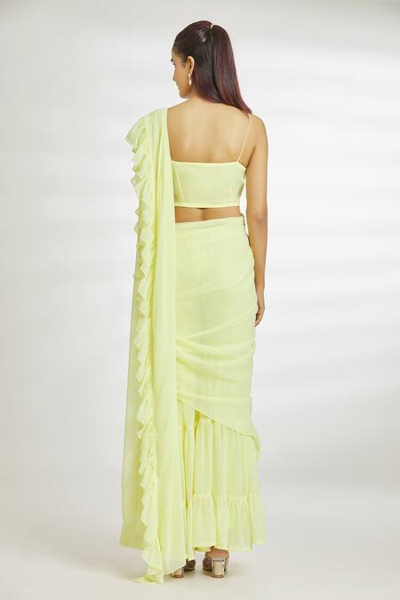 Shop_Naintara Bajaj_Yellow Georgette Beads Square Neck Ruffled Sharara Saree With Blouse_at_Aza_Fashions