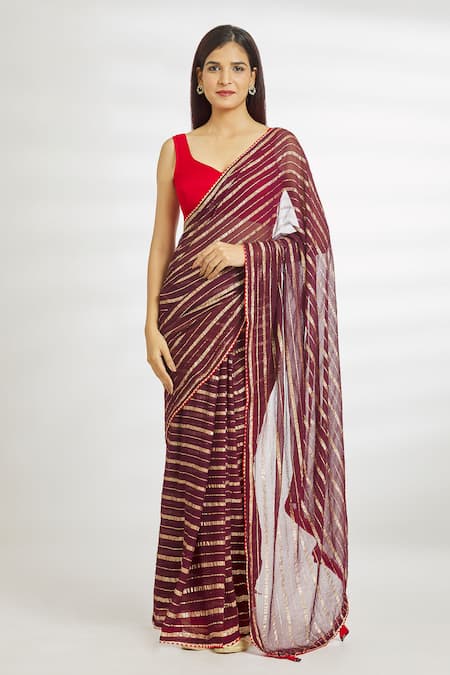 Brown Satin Shimmer Designer saree features leaf-vine designs on its body,  contrast embroidery patch work border