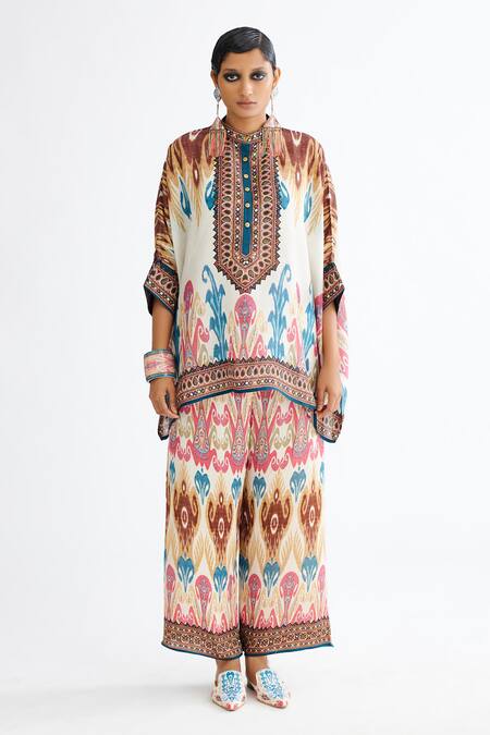 Buy Rajdeep Ranawat Multi Color Silk Bandeau Neck Chanel Printed Tunic And Flared Pant Set Online at Aza Fashions Buy_Rajdeep Ranawat_Multi Color Silk Bandeau Neck Chanel Printed Tunic And Flared Pant Set_Online_at_Aza_Fashions