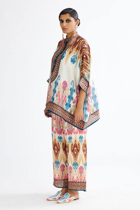 Shop Rajdeep Ranawat Multi Color Silk Bandeau Neck Chanel Printed Tunic And Flared Pant Set Online at Aza Fashions Shop_Rajdeep Ranawat_Multi Color Silk Bandeau Neck Chanel Printed Tunic And Flared Pant Set_Online_at_Aza_Fashions