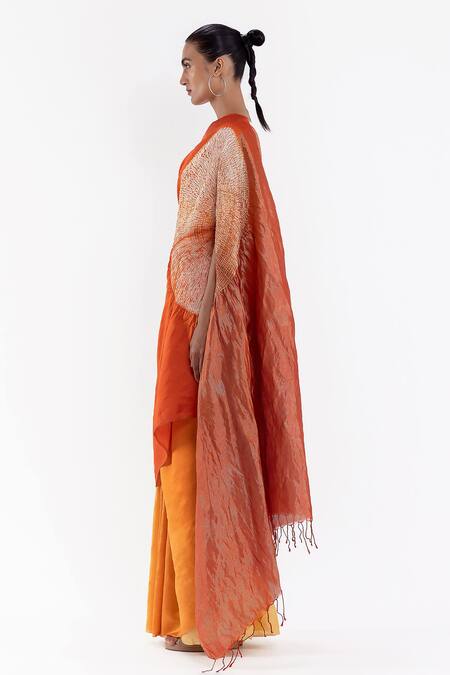 Shop Studio Medium Orange Silk Shibori Pattern Saree With Running Blouse at Aza Fashions Shop_Studio Medium_Orange Silk Shibori Pattern Saree With Running Blouse_at_Aza_Fashions