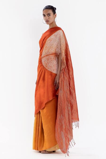 Studio Medium Orange Silk Shibori Pattern Saree With Running Blouse Online at Aza Fashions Studio Medium_Orange Silk Shibori Pattern Saree With Running Blouse_Online_at_Aza_Fashions