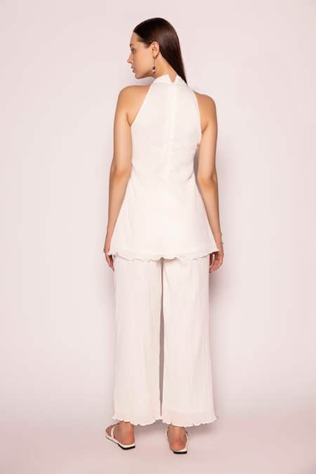 Shop Shimona Off White Cotton Halter Neck Solid Top And Pant Set at Aza Fashions Shop_Shimona_Off White Cotton Halter Neck Solid Top And Pant Set _at_Aza_Fashions