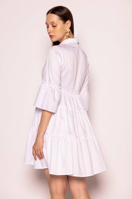Shop Shimona White Cotton Satin Solid Shirt Collar Pearl On The Beach Tiered Dress at Aza Fashions Shop_Shimona_White Cotton Satin Solid Shirt Collar Pearl On The Beach Tiered Dress _at_Aza_Fashions