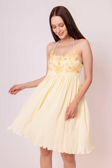 Shop Shimona Yellow Cotton Embroidery Halter Neck Iris Floral Cutwrok Dress Online at Aza Fashions Shop_Shimona_Yellow Cotton Embroidery Halter Neck Iris Floral Cutwrok Dress _Online_at_Aza_Fashions