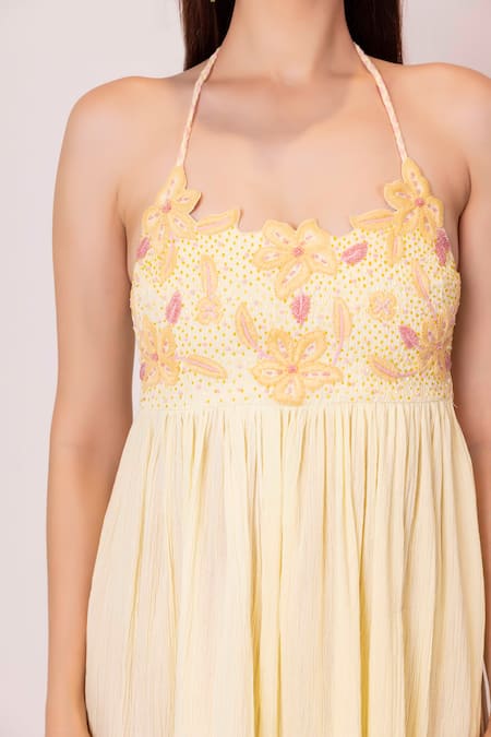 Shimona Yellow Cotton Embroidery Halter Neck Iris Floral Cutwrok Dress at Aza Fashions Shimona_Yellow Cotton Embroidery Halter Neck Iris Floral Cutwrok Dress _at_Aza_Fashions