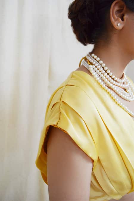 Shop Ahmev Yellow Modal, Silk Plunge Neck Alluring Shoulder Pleated Blouse Online at Aza Fashions Shop_Ahmev_Yellow Modal, Silk Plunge Neck Alluring Shoulder Pleated Blouse _Online_at_Aza_Fashions