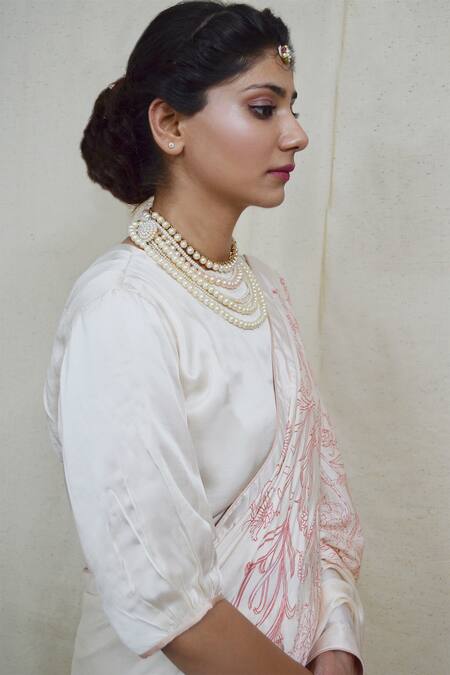 Ahmev Ivory Modal, Silk Round Neck Ethereal Shoulder Sleeve Pleated Blouse at Aza Fashions Ahmev_Ivory Modal, Silk Round Neck Ethereal Shoulder Sleeve Pleated Blouse _at_Aza_Fashions