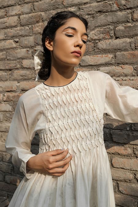Buy Ahmev Ivory Chanderi Embroidery Round Neck Snowdrop Smocked Bodice Dress With Slip Online at Aza Fashions Buy_Ahmev_Ivory Chanderi Embroidery Round Neck Snowdrop Smocked Bodice Dress With Slip _Online_at_Aza_Fashions