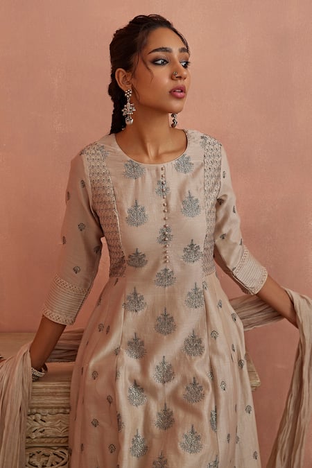 Kritika Dawar Ivory Chanderi, Cotton Embroidery, Cut Work Round Neck A-line Kurta Set at Aza Fashions Kritika Dawar_Ivory Chanderi, Cotton Embroidery, Cut Work Round Neck A-line Kurta Set _at_Aza_Fashions
