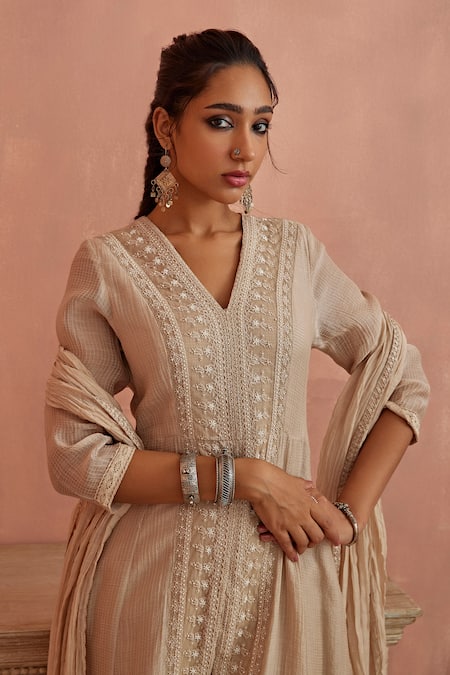 Kritika Dawar Ivory Kota Doria, Chanderi, Cotton Placket Embroidered A-line Kurta Pant Set at Aza Fashions Kritika Dawar_Ivory Kota Doria, Chanderi, Cotton Placket Embroidered A-line Kurta Pant Set _at_Aza_Fashions