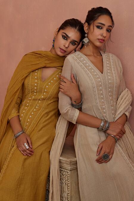 Kritika Dawar Yellow Kota Doria, Chanderi, Cotton Pearls, Lace V-neck A-line Kurta Pant Set at Aza Fashions Kritika Dawar_Yellow Kota Doria, Chanderi, Cotton Pearls, Lace V-neck A-line Kurta Pant Set _at_Aza_Fashions