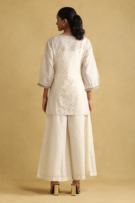 Shop Ritu Kumar Off White Cotton, Silk Embroidery Round Neck Short Kurta And Palazzo Set at Aza Fashions Shop_Ritu Kumar_Off White Cotton, Silk Embroidery Round Neck Short Kurta And Palazzo Set _at_Aza_Fashions