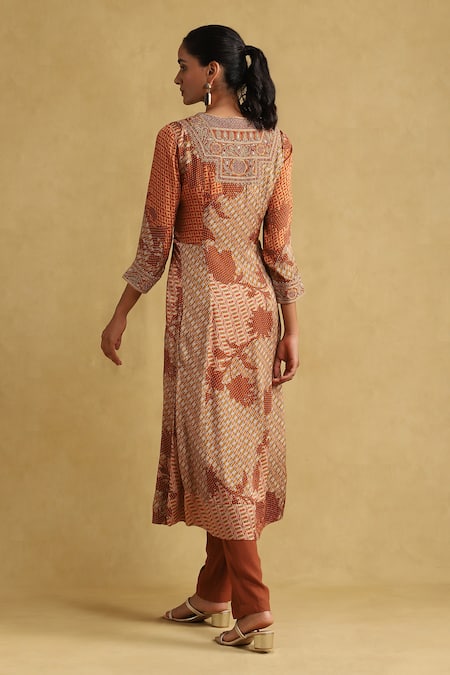 Shop Ritu Kumar Orange Viscose Embroidery, Tassels Boat Neck Micro Print Kurta Pant Set at Aza Fashions Shop_Ritu Kumar_Orange Viscose Embroidery, Tassels Boat Neck Micro Print Kurta Pant Set _at_Aza_Fashions