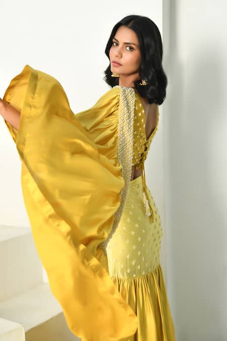 Shop NUHH Yellow Satin Pearls Round Neck Mermaid Pre Draped Ruffle Saree With Blouse at Aza Fashions Shop_NUHH_Yellow Satin Pearls Round Neck Mermaid Pre Draped Ruffle Saree With Blouse _at_Aza_Fashions