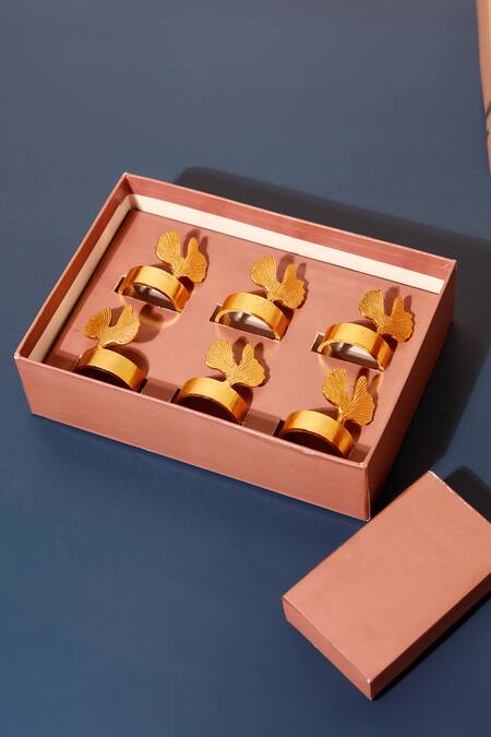 Shop Elysian Home Gold Brass Crown Napkin Rings Set Of 6 at Aza Fashions Shop_Elysian Home_Gold Brass Crown Napkin Rings Set Of 6_at_Aza_Fashions