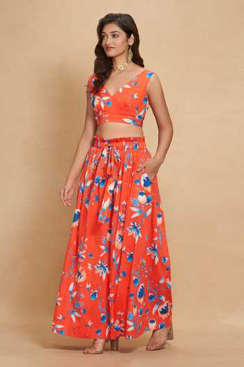 Gulabo By Abu Sandeep Red Cotton Satin Lotus Floral Bloom Print Flared Pant at Aza Fashions Gulabo By Abu Sandeep_Red Cotton Satin Lotus Floral Bloom Print Flared Pant _at_Aza_Fashions