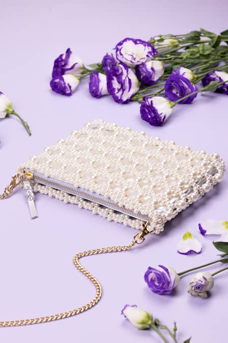Shop The Leather Garden Ivory Beads Jaisalmer Pearl Embroidered Crossbody Bag With Pouch - 4 Pcs at Aza Fashions Shop_The Leather Garden_Ivory Beads Jaisalmer Pearl Embroidered Crossbody Bag With Pouch - 4 Pcs _at_Aza_Fashions