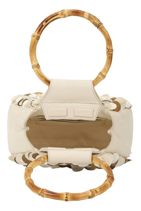 The Leather Garden Ivory Pearl Shells Udaipur Embroidered Potli Bag at Aza Fashions The Leather Garden_Ivory Pearl Shells Udaipur Embroidered Potli Bag _at_Aza_Fashions