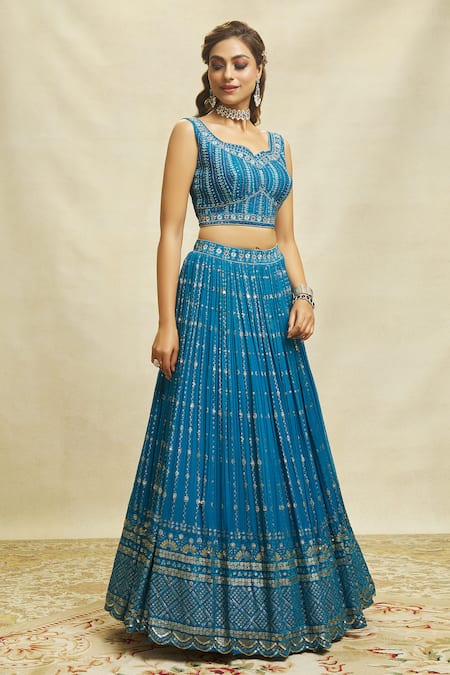 Shop Ariyana By Aza Blue Silk, Net, Georgette Embroidery, Sequins Asymmetric Scalloped Lehenga Set Online at Aza Fashions Shop_Ariyana By Aza_Blue Silk, Net, Georgette Embroidery, Sequins Asymmetric Scalloped Lehenga Set _Online_at_Aza_Fashions