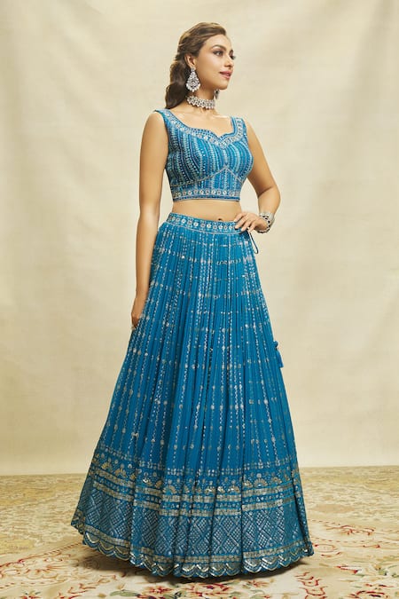 Ariyana By Aza Blue Silk, Net, Georgette Embroidery, Sequins Asymmetric Scalloped Lehenga Set at Aza Fashions Ariyana By Aza_Blue Silk, Net, Georgette Embroidery, Sequins Asymmetric Scalloped Lehenga Set _at_Aza_Fashions