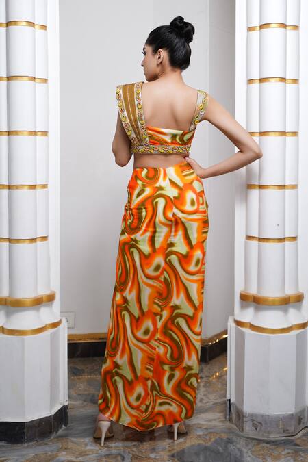 Shop Ahi Clothing Orange Hemp, Linen, Crepe Sequins, Mirrors Abstract Print Skirt Bustier Set at Aza Fashions Shop_Ahi Clothing_Orange Hemp, Linen, Crepe Sequins, Mirrors Abstract Print Skirt Bustier Set _at_Aza_Fashions