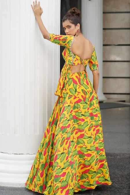 Shop Ahi Clothing Yellow Crepe Mirrors, Zari Sweetheart Floral Print Peplum Blouse And Lehenga Set at Aza Fashions Shop_Ahi Clothing_Yellow Crepe Mirrors, Zari Sweetheart Floral Print Peplum Blouse And Lehenga Set _at_Aza_Fashions