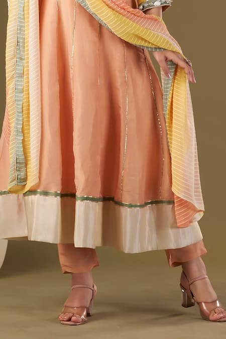 Shop Affroz Peach Tissue, Silk Pearls V-neck Cowrie Shells Embroidered Anarkali Pant Set Online at Aza Fashions Shop_Affroz_Peach Tissue, Silk Pearls V-neck Cowrie Shells Embroidered Anarkali Pant Set_Online_at_Aza_Fashions
