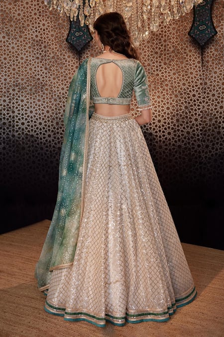 Shop Cedar & Pine Ivory Organza Sequins, Embroidery V-neck Jaali Lehenga Set at Aza Fashions Shop_Cedar & Pine_Ivory Organza Sequins, Embroidery V-neck Jaali Lehenga Set _at_Aza_Fashions