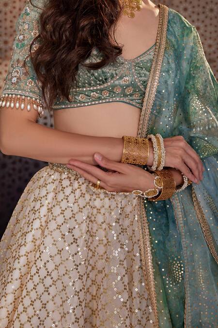 Buy Cedar & Pine Ivory Organza Sequins, Embroidery V-neck Jaali Lehenga Set Online at Aza Fashions Buy_Cedar & Pine_Ivory Organza Sequins, Embroidery V-neck Jaali Lehenga Set _Online_at_Aza_Fashions