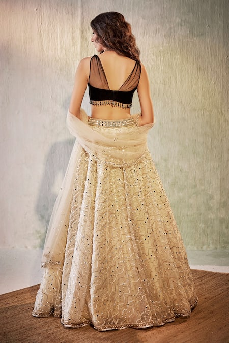 Shop Cedar & Pine Ivory Velvet, Organza, Tulle Pearls, Sequins, Waves Work Lehenga Blouse Set at Aza Fashions Shop_Cedar & Pine_Ivory Velvet, Organza, Tulle Pearls, Sequins, Waves Work Lehenga Blouse Set _at_Aza_Fashions