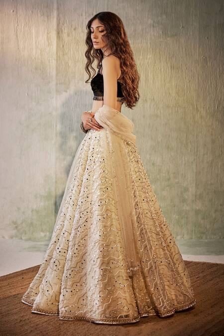Buy Cedar & Pine Ivory Velvet, Organza, Tulle Pearls, Sequins, Waves Work Lehenga Blouse Set Online at Aza Fashions Buy_Cedar & Pine_Ivory Velvet, Organza, Tulle Pearls, Sequins, Waves Work Lehenga Blouse Set _Online_at_Aza_Fashions