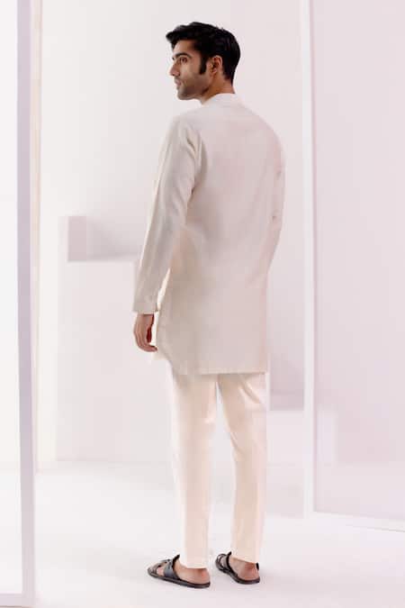 Shop Devnaagri Ivory Silk, Chanderi, Cotton Embroidery Floral Dori Yoke Kurta With Pant at Aza Fashions Shop_Devnaagri_Ivory Silk, Chanderi, Cotton Embroidery Floral Dori Yoke Kurta With Pant _at_Aza_Fashions