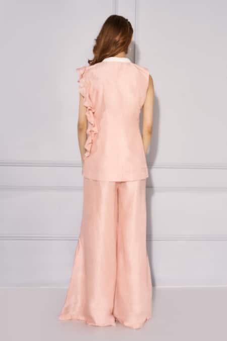 Shop Kressa Pink Silk Embroidery V-neck Hand Motif Top And Flared Pant Set at Aza Fashions Shop_Kressa_Pink Silk Embroidery V-neck Hand Motif Top And Flared Pant Set_at_Aza_Fashions