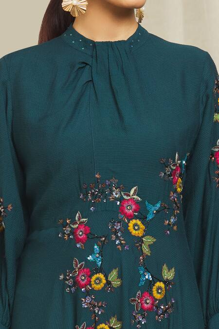 Bhusattva Blue Cotton Embroidery High Neck Bishop Sleeve Floral Dress at Aza Fashions Bhusattva_Blue Cotton Embroidery High Neck Bishop Sleeve Floral Dress _at_Aza_Fashions