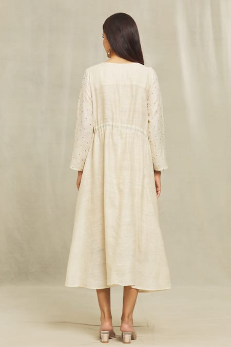 Shop Bhusattva Beige Silk Embroidery Round Neck Floral Front Tie Dress at Aza Fashions Shop_Bhusattva_Beige Silk Embroidery Round Neck Floral Front Tie Dress _at_Aza_Fashions