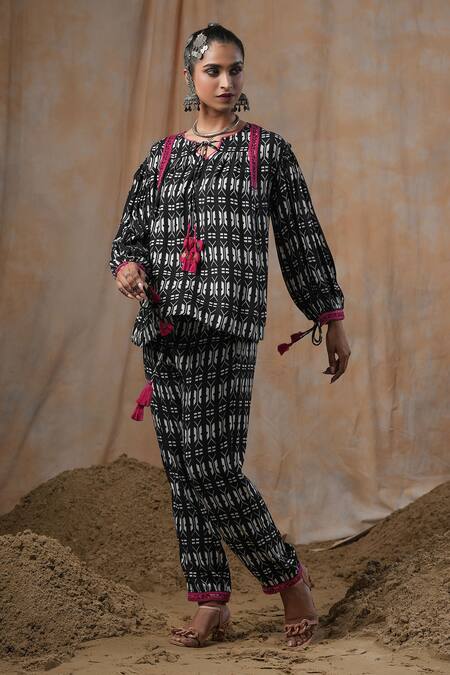 Shop_Nyaro_Black Viscose, Modal Tassels Round Neck Printed Front Tie Top With Pant _Online_at_Aza_Fashions