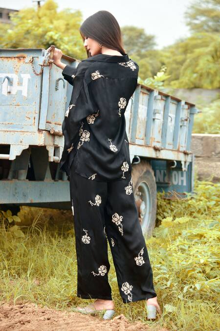Shop Nyaro Black Viscose, Satin Embroidery Shawl Neck Thread Rose Shirt With Pant at Aza Fashions Shop_Nyaro_Black Viscose, Satin Embroidery Shawl Neck Thread Rose Shirt With Pant_at_Aza_Fashions