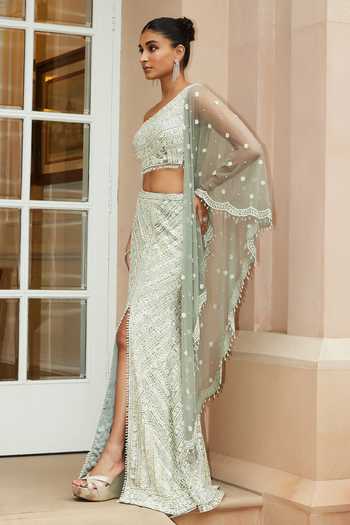 Nitika Gujral Gray Net, Satin Sequins, Grey Embroidered One Shoulder Blouse Skirt Set Online at Aza Fashions Nitika Gujral_Gray Net, Satin Sequins, Grey Embroidered One Shoulder Blouse Skirt Set _Online_at_Aza_Fashions