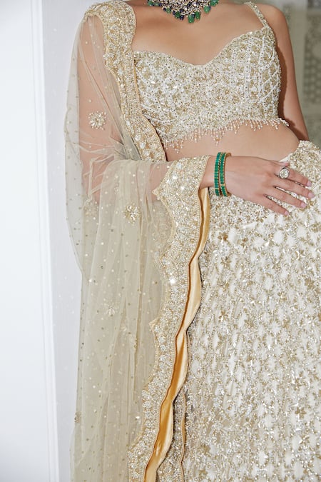 Buy_Nitika Gujral_Beige Net, Satin Sequins, Beads And Crystal Embroidered Bridal Lehenga Set _Online_at_Aza_Fashions