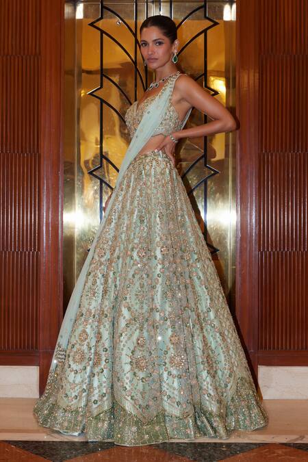 Buy_Nitika Gujral_Green Net, Satin Sequins, Crystals, Floral Bloom Embroidered Bridal Lehenga Set _Online_at_Aza_Fashions