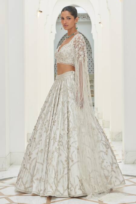 Nitika Gujral_Ivory Net, Satin Sequins, Crystals, Beads Floral Garden Embroidered Lehenga Set _Online_at_Aza_Fashions
