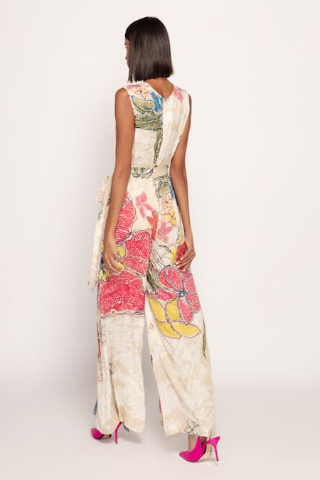 Shop_Saaksha & Kinni_Ivory Satin V-neck Periwinkle Print Jumpsuit _at_Aza_Fashions