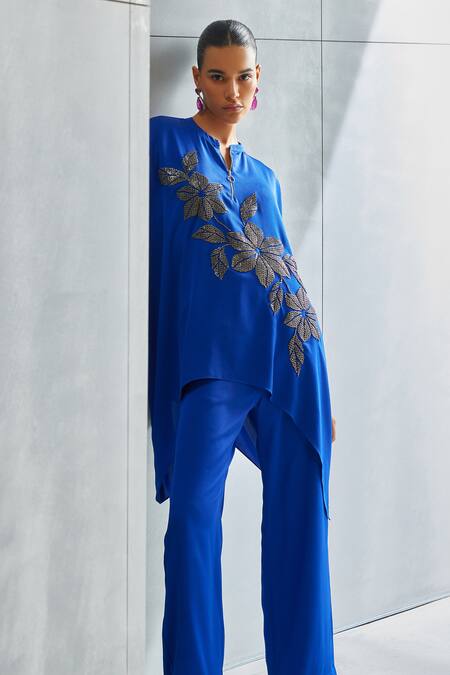Shop Namrata Joshipura Blue Satin Embellished Stone Mandarin Collar Riverleaf Floral Asymmetric Tunic at Aza Fashions Shop_Namrata Joshipura_Blue Satin Embellished Stone Mandarin Collar Riverleaf Floral Asymmetric Tunic _at_Aza_Fashions