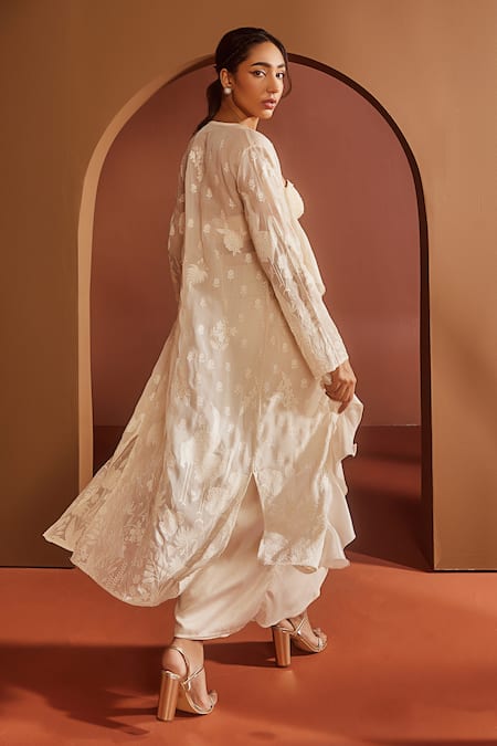 Shop SAANJH BY LEA Ivory Satin, Organza, Chiffon Embroidery Sweetheart Neck Cape Skirt Set at Aza Fashions Shop_SAANJH BY LEA_Ivory Satin, Organza, Chiffon Embroidery Sweetheart Neck Cape Skirt Set _at_Aza_Fashions