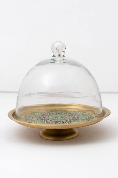 Shop Nakshikathaa - Homeware Gold Brass Utsav Cake Stand With Glass Cloche at Aza Fashions Shop_Nakshikathaa - Homeware_Gold Brass Utsav Cake Stand With Glass Cloche_at_Aza_Fashions