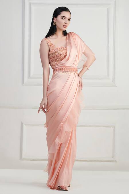 Nishta Studio Peach Satin, Net, Crepe Sequins, Ruffle Pre-draped Saree With Embroidered Blouse Online at Aza Fashions Nishta Studio_Peach Satin, Net, Crepe Sequins, Ruffle Pre-draped Saree With Embroidered Blouse_Online_at_Aza_Fashions