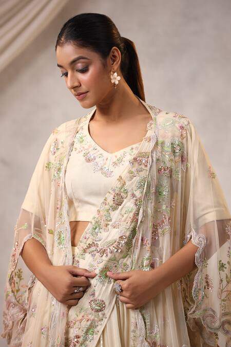 K-Anshika_Off White Georgette Sequins, Beads, Embroidery V-neck Lehenga Cape Set _Online_at_Aza_Fashions